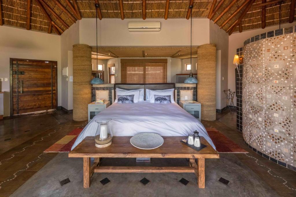 Letto o letti in una camera di Muluwa Lodge