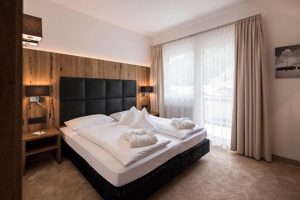 Postel nebo postele na pokoji v ubytování Hotel Aaritz