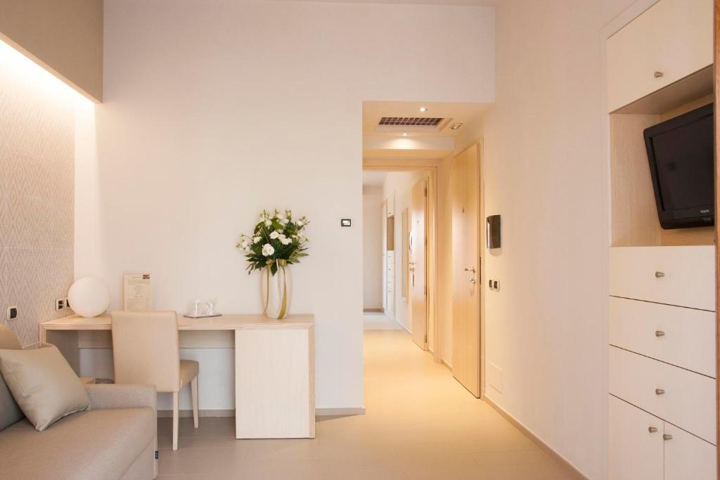 Een TV en/of entertainmentcenter bij Hotel Corte Rosada

