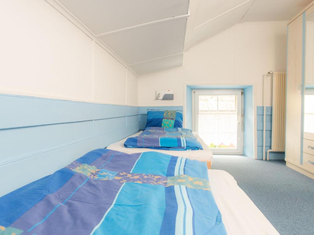 Postel nebo postele na pokoji v ubytování Gasthaus Pension zum Turm
