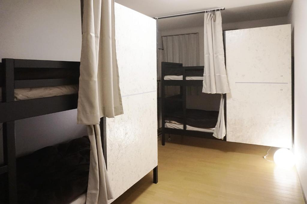 Postel nebo postele na pokoji v ubytování Guesthouse 66