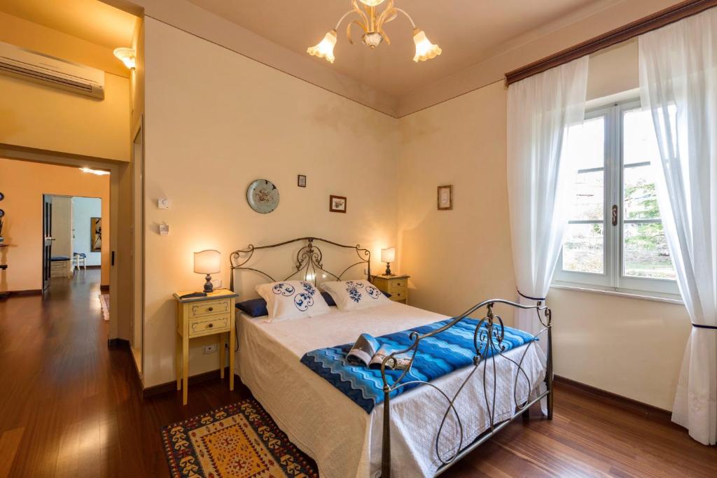 Postel nebo postele na pokoji v ubytování Agriturismo CaseGraziani