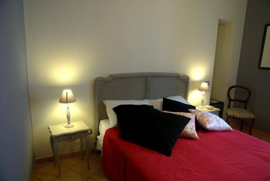 Łóżko lub łóżka w pokoju w obiekcie B&B Verdi