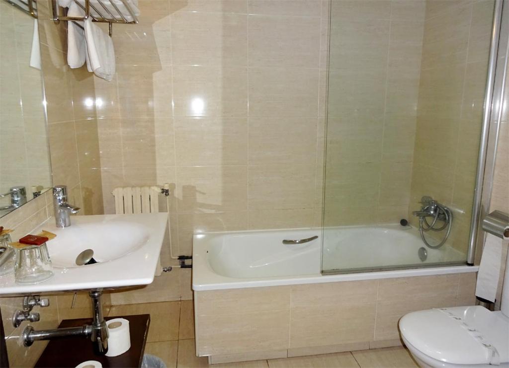 Koupelna v ubytování Hotel Millan