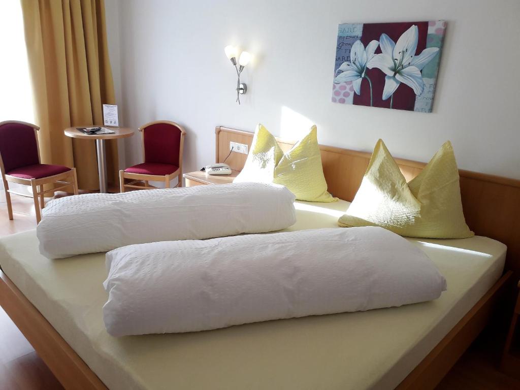 Postel nebo postele na pokoji v ubytování Reschnerhof