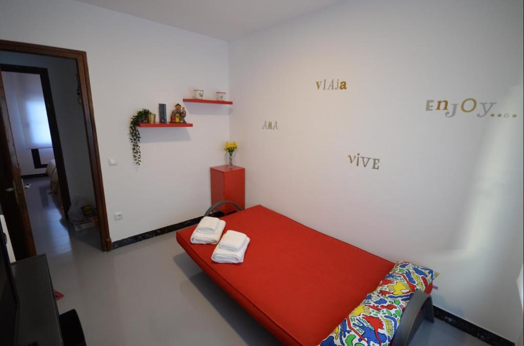 A bed or beds in a room at Ohana Apartamento Rural