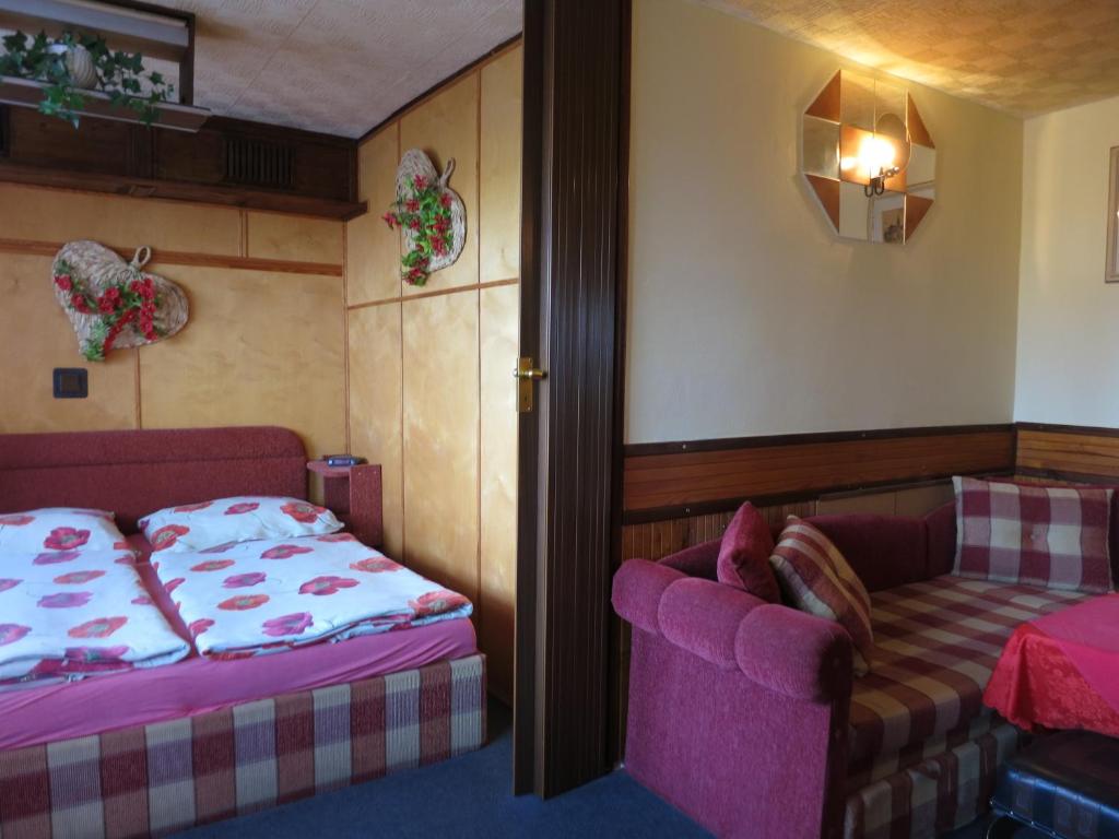 Postel nebo postele na pokoji v ubytování Pension Nika