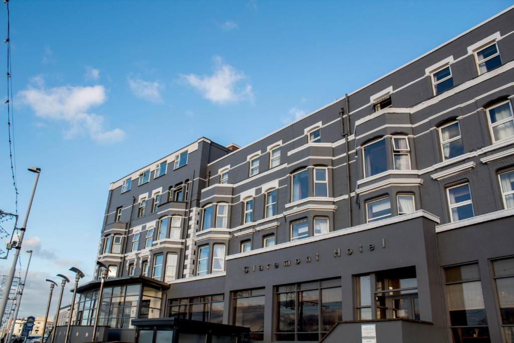 a large building on the side of a street at Claremont Hotel - All Inclusive! in Blackpool