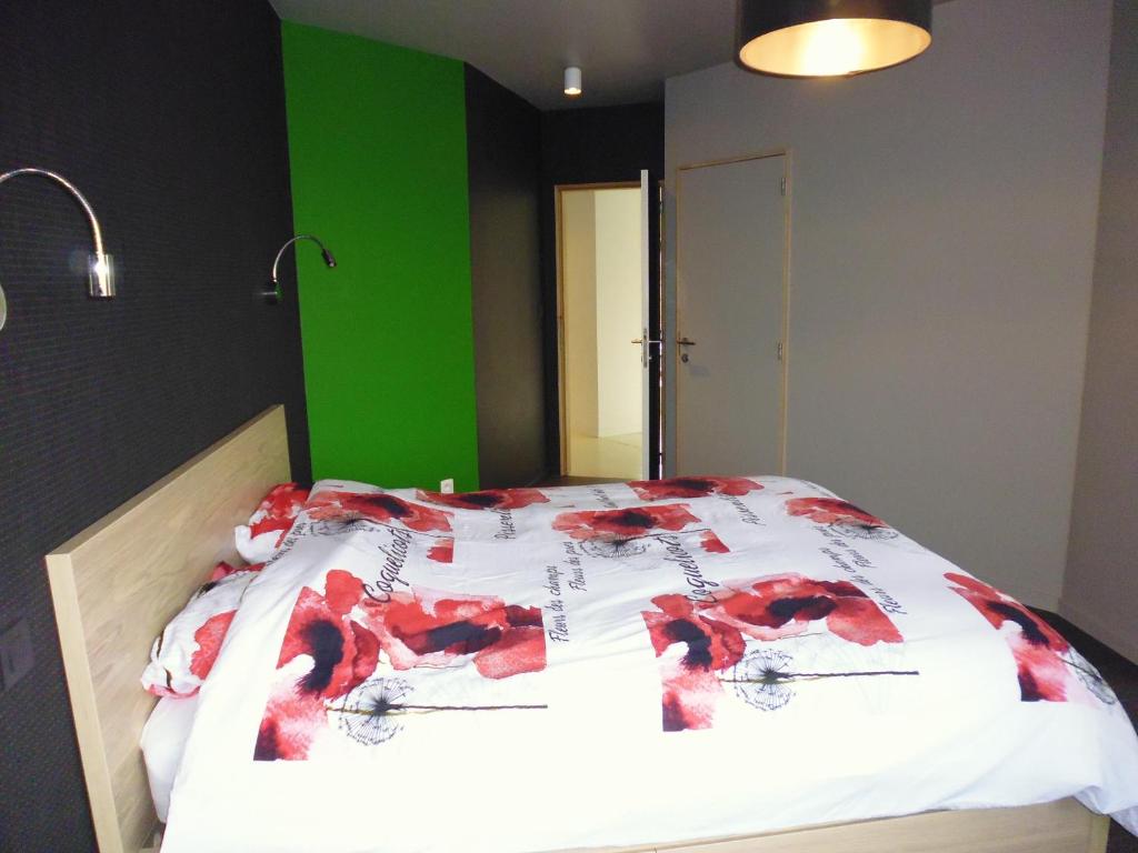 Postel nebo postele na pokoji v ubytování Gîte Les 4 Vins