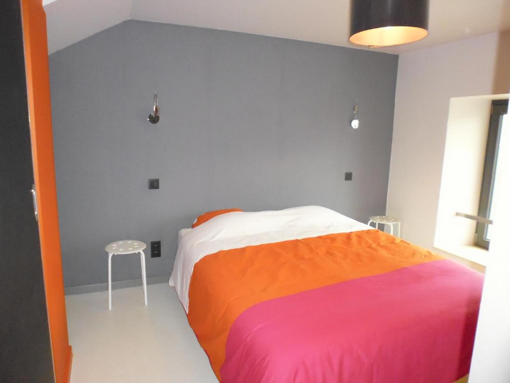 Postel nebo postele na pokoji v ubytování Gîte Les 4 Vins