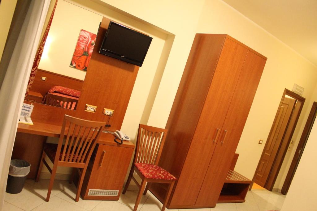 TV a/nebo společenská místnost v ubytování Hotel Vitti