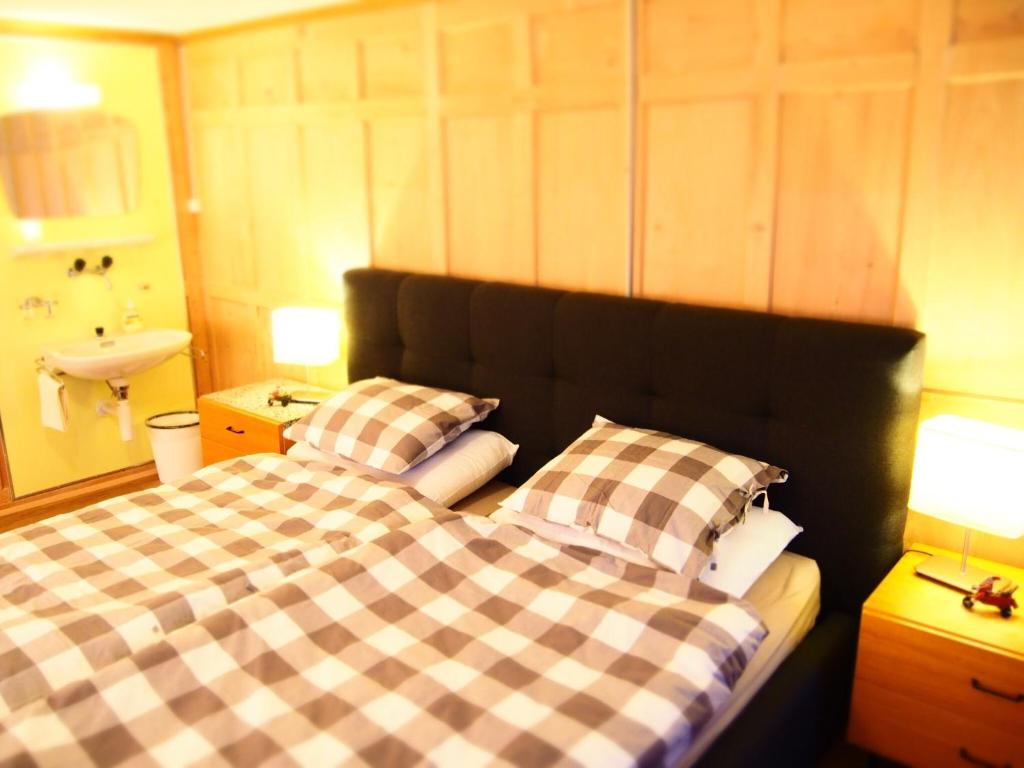Postel nebo postele na pokoji v ubytování Hotel Dalla Posta Platta