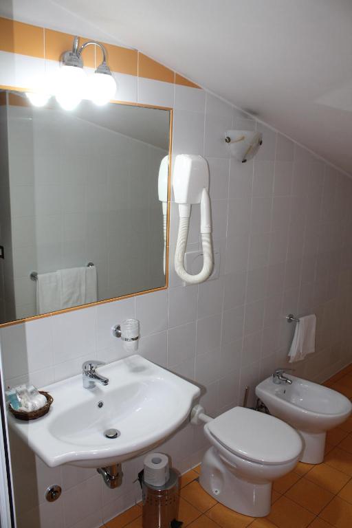 Koupelna v ubytování Hotel Vitti