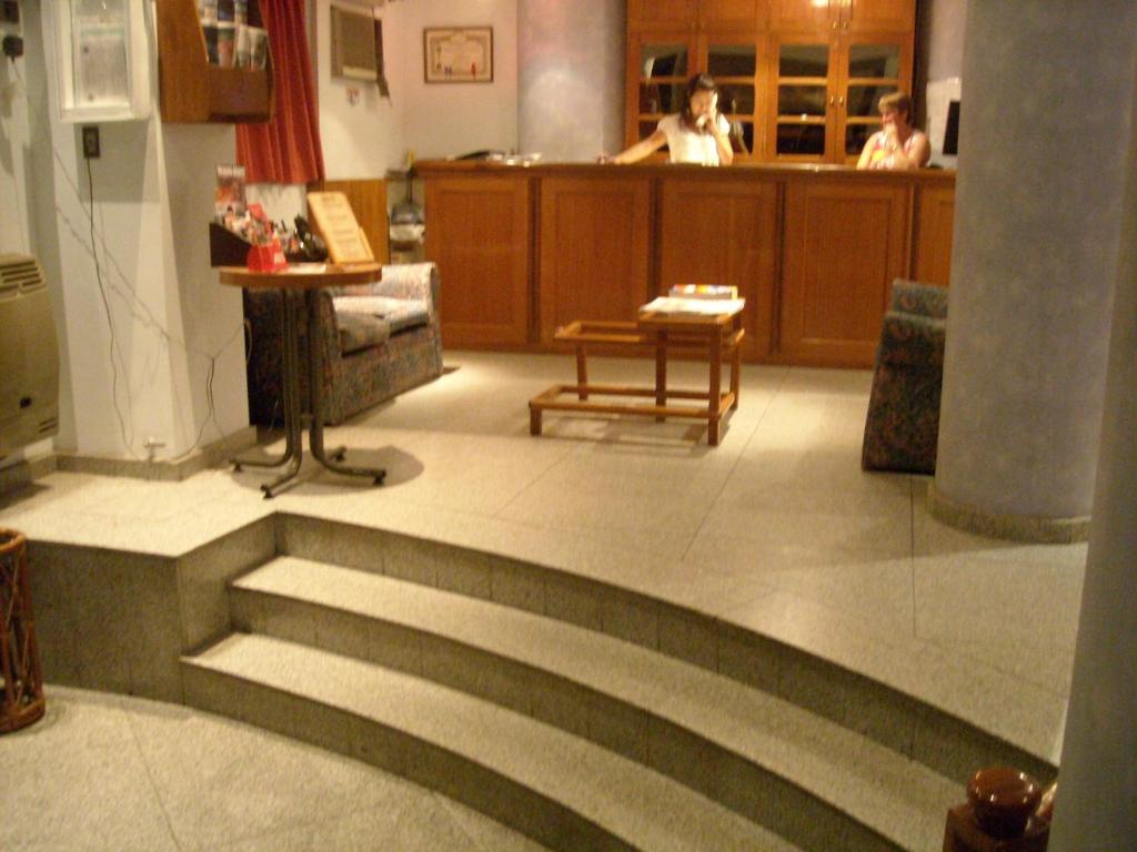 El vestíbulo o zona de recepción de Apart Hotel Magali
