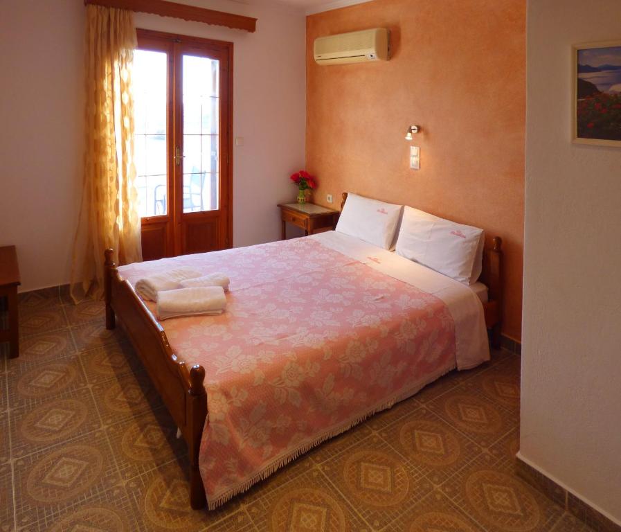 Postel nebo postele na pokoji v ubytování Villa Georgia