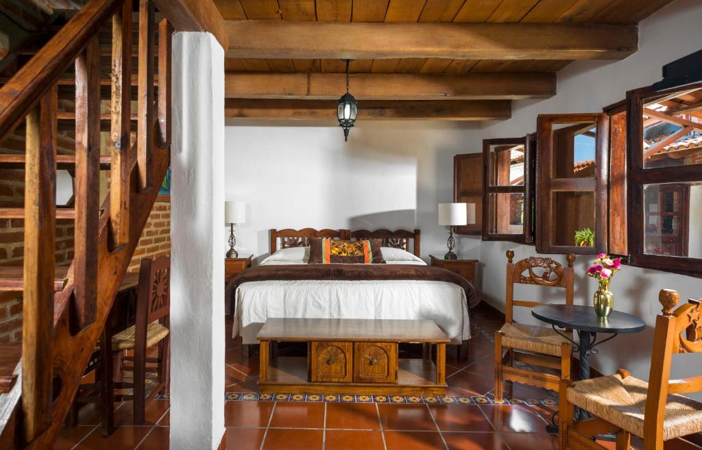 Postel nebo postele na pokoji v ubytování Hotel de Campiña