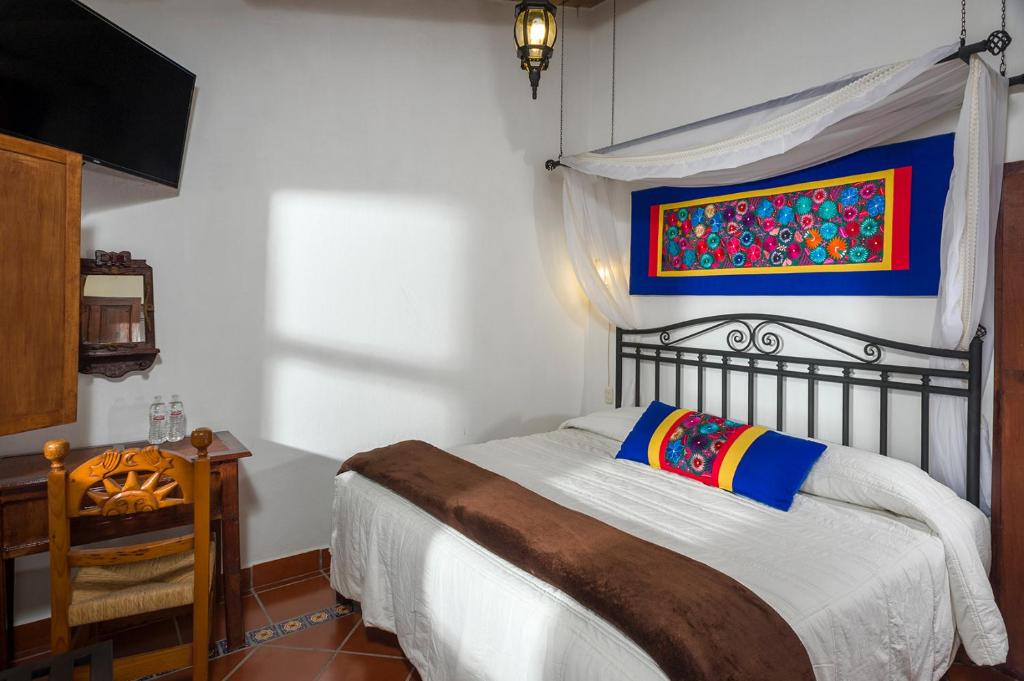 Postel nebo postele na pokoji v ubytování Hotel de Campiña