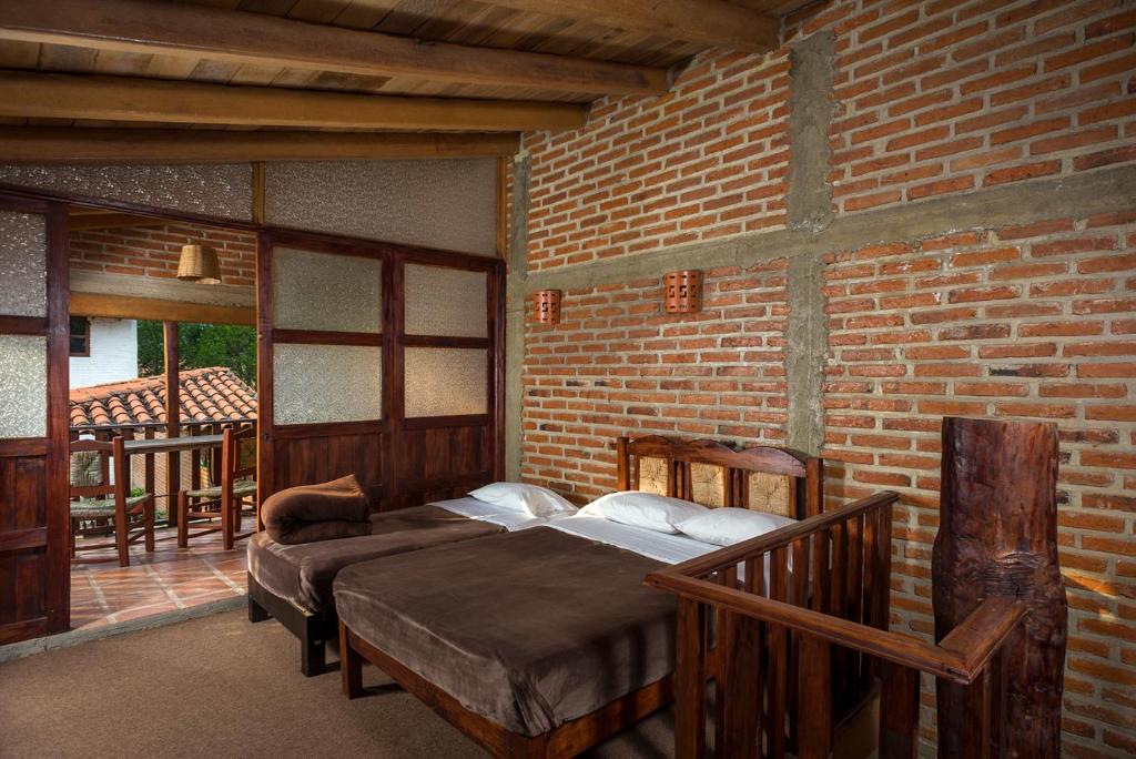 Postel nebo postele na pokoji v ubytování Hotel de Campiña