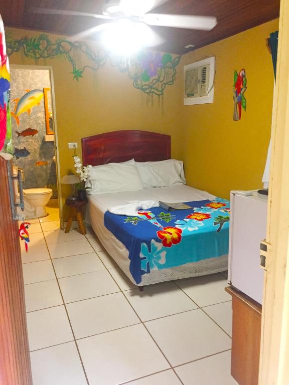 Postel nebo postele na pokoji v ubytování Cabinas Jimenez