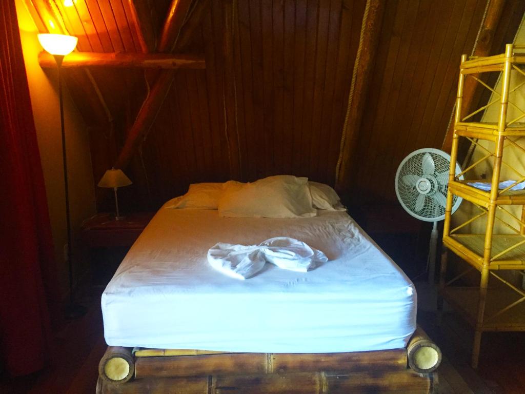 Postel nebo postele na pokoji v ubytování Cabinas Jimenez