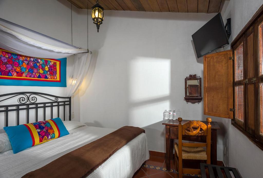 Postel nebo postele na pokoji v ubytování Hotel de Campiña