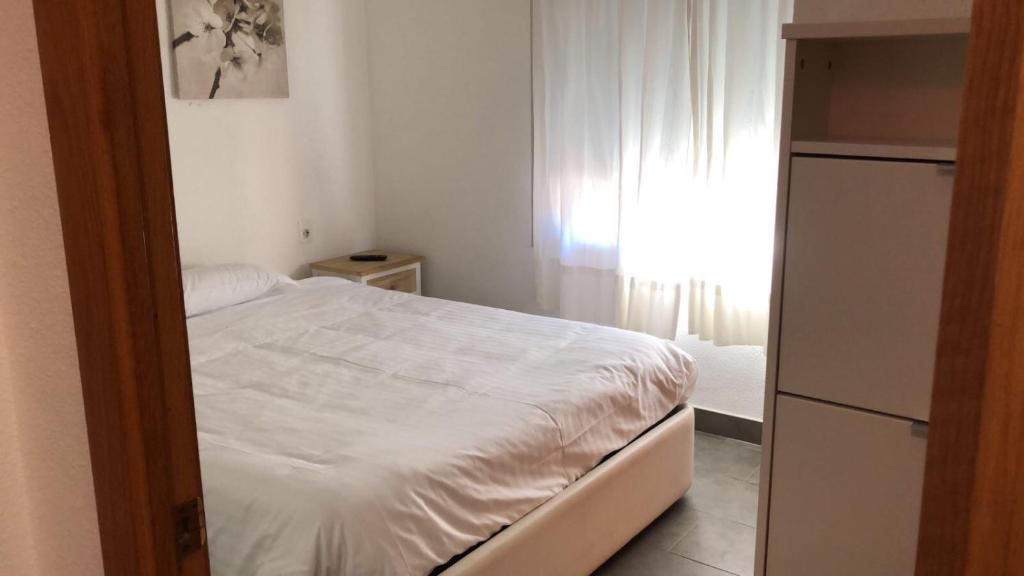 Postel nebo postele na pokoji v ubytování SI Apartamentos Benicassim