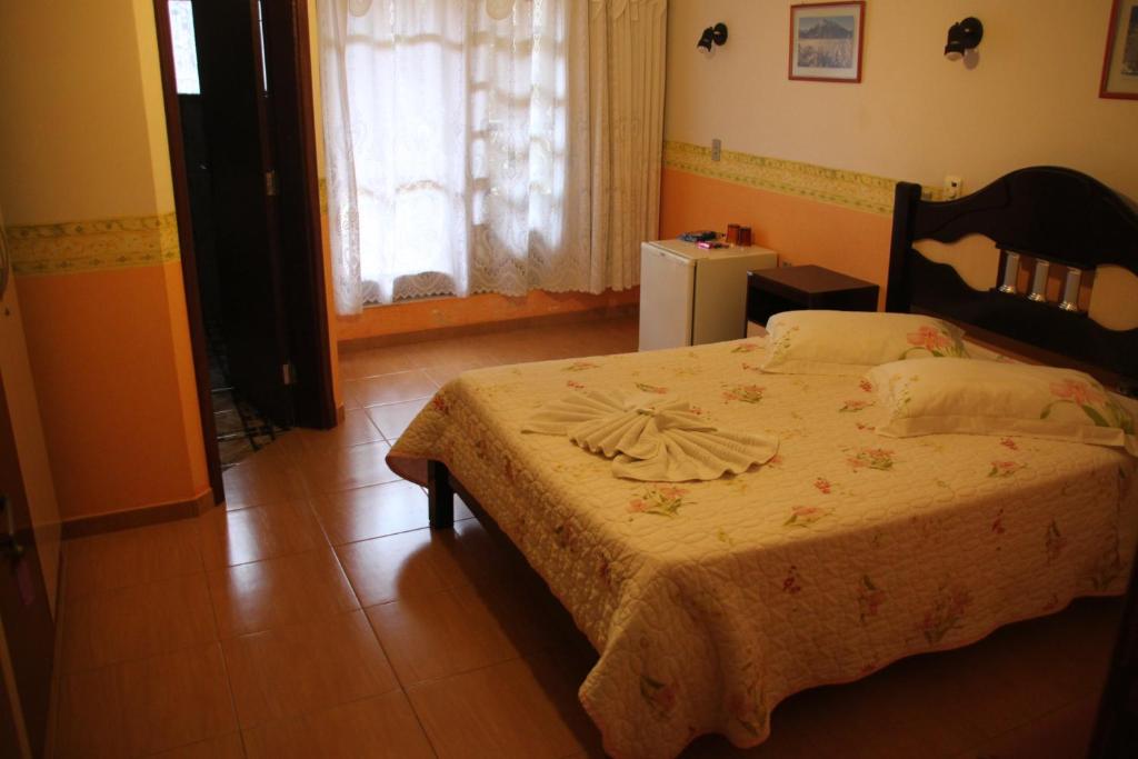 Postel nebo postele na pokoji v ubytování Pousada Vollweiter