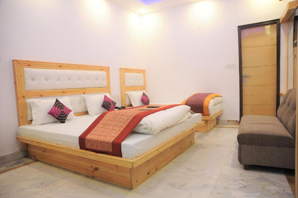 Postel nebo postele na pokoji v ubytování Hotel Delhi Fantastic near New Delhi Train Station