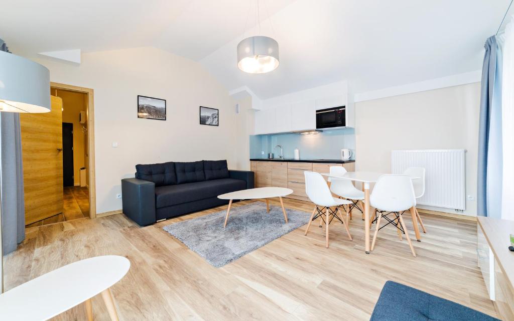 Posedenie v ubytovaní Apartamenty Sun & Snow Szklarska Perła