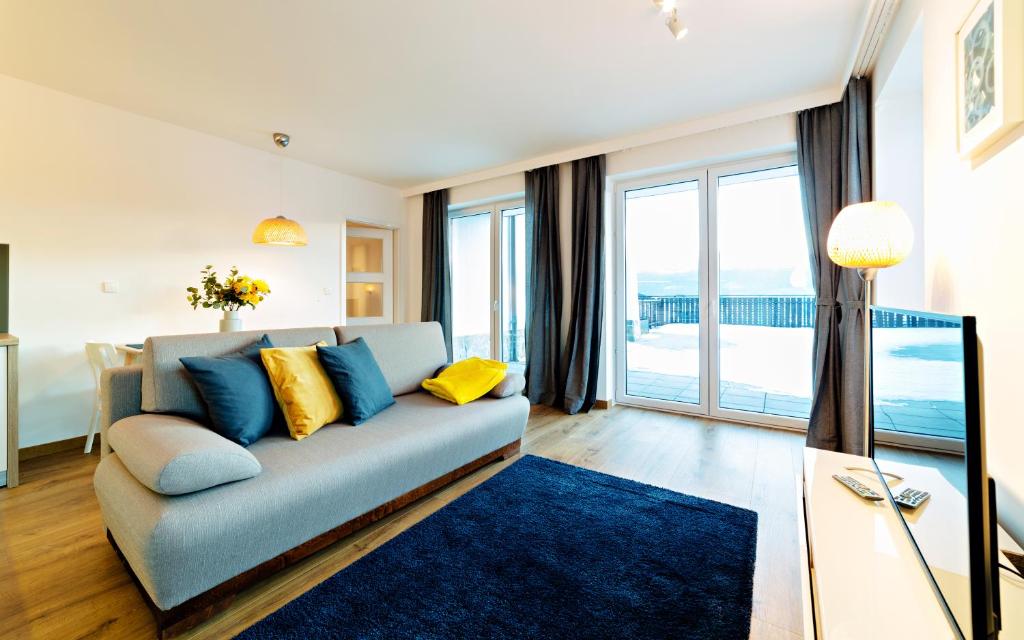 Posteľ alebo postele v izbe v ubytovaní Apartamenty Sun & Snow Szklarska Perła
