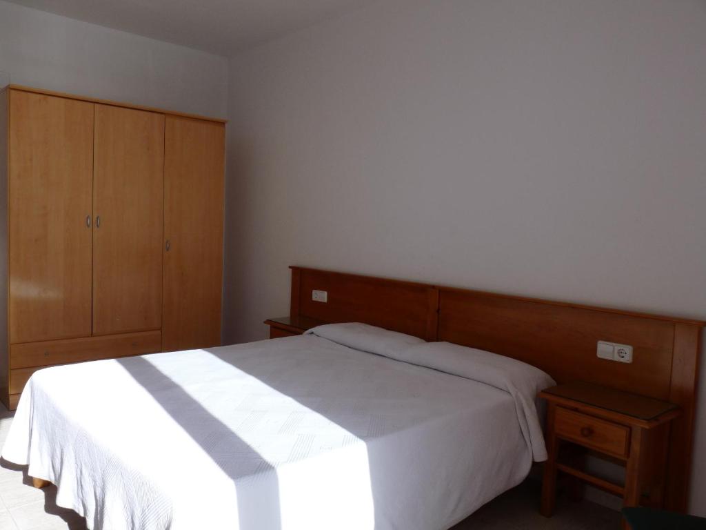 Postel nebo postele na pokoji v ubytování Apartaments Tropic