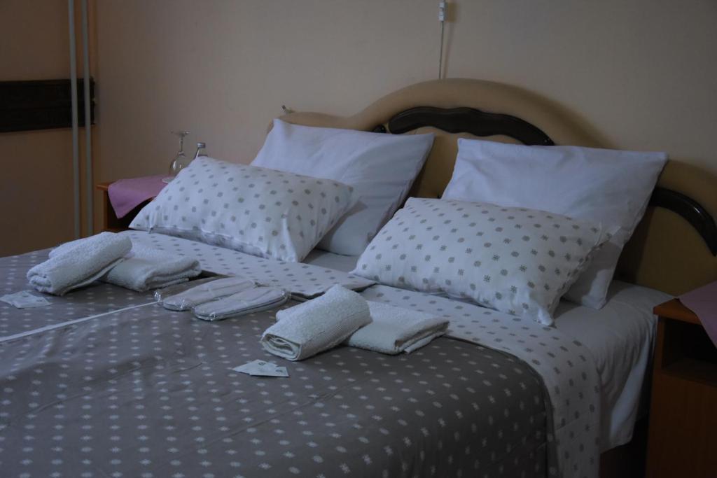Postel nebo postele na pokoji v ubytování Hotel Duga