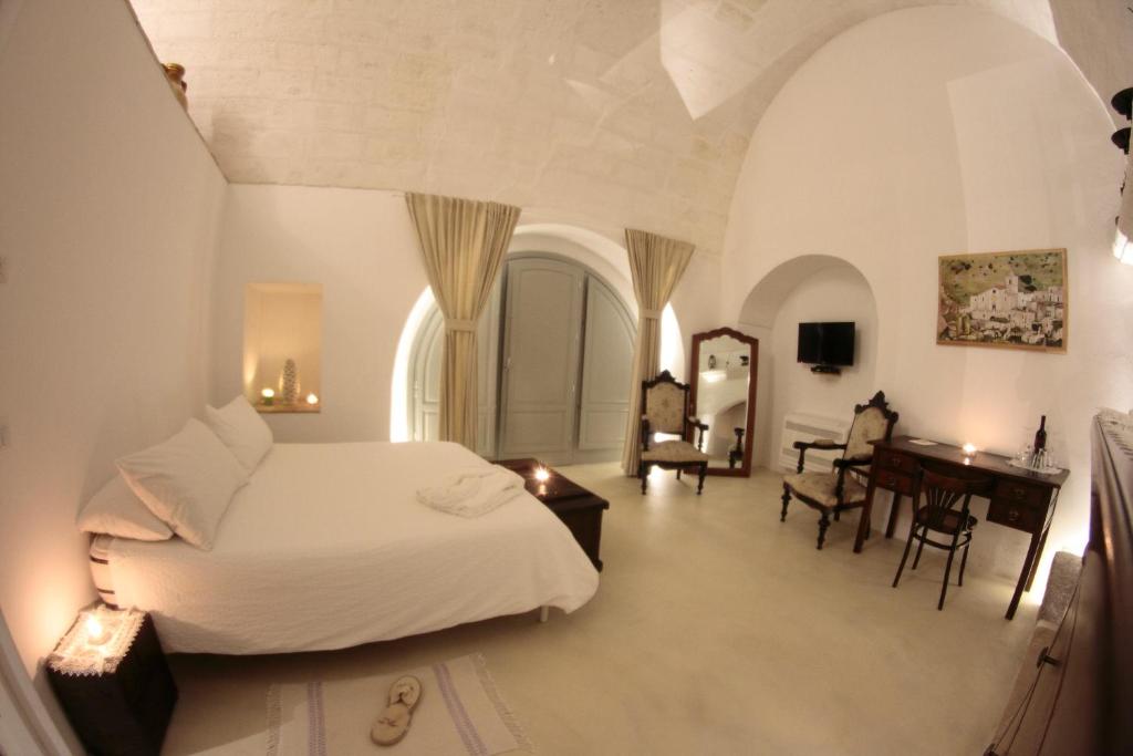 Postel nebo postele na pokoji v ubytování Albergo Diffuso Il Casale