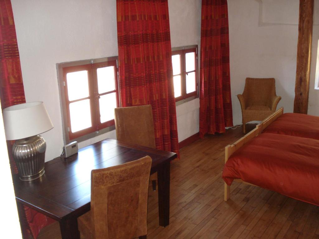 Postel nebo postele na pokoji v ubytování Chambres d'hôtes Notre Paradis