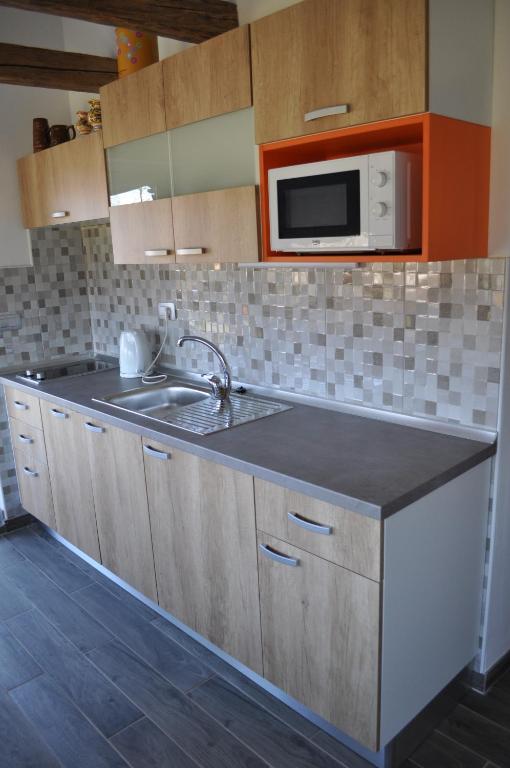 Kuchyň nebo kuchyňský kout v ubytování Guesthouse ANKL