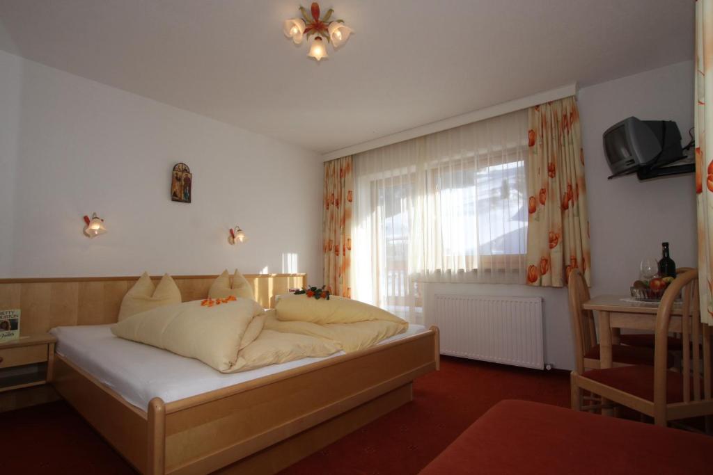 Postel nebo postele na pokoji v ubytování Lechlihof
