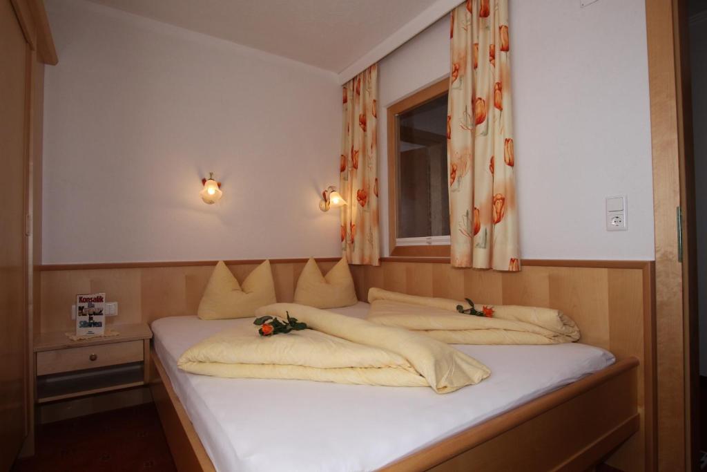 Postel nebo postele na pokoji v ubytování Lechlihof