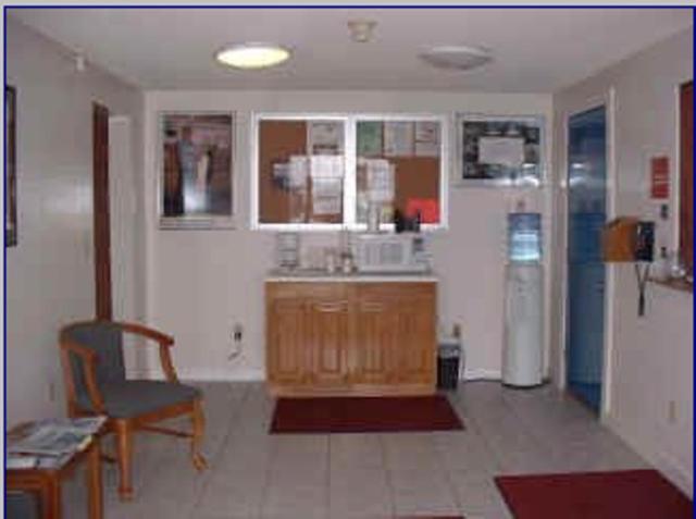 Kuchyň nebo kuchyňský kout v ubytování Port Lodge Motel