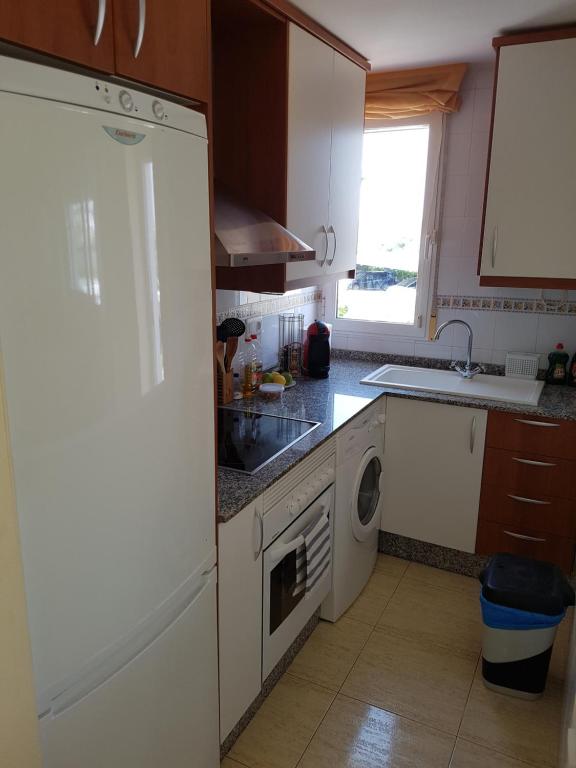 Kuchyň nebo kuchyňský kout v ubytování Vera Rental Torremar Natura