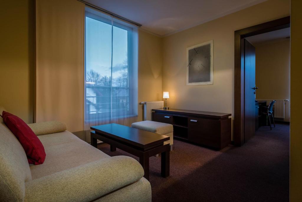 Postel nebo postele na pokoji v ubytování Hotel Villa Bianca