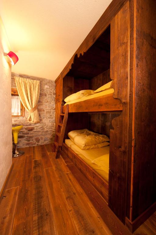Postel nebo postele na pokoji v ubytování Il Fienile della Nonna