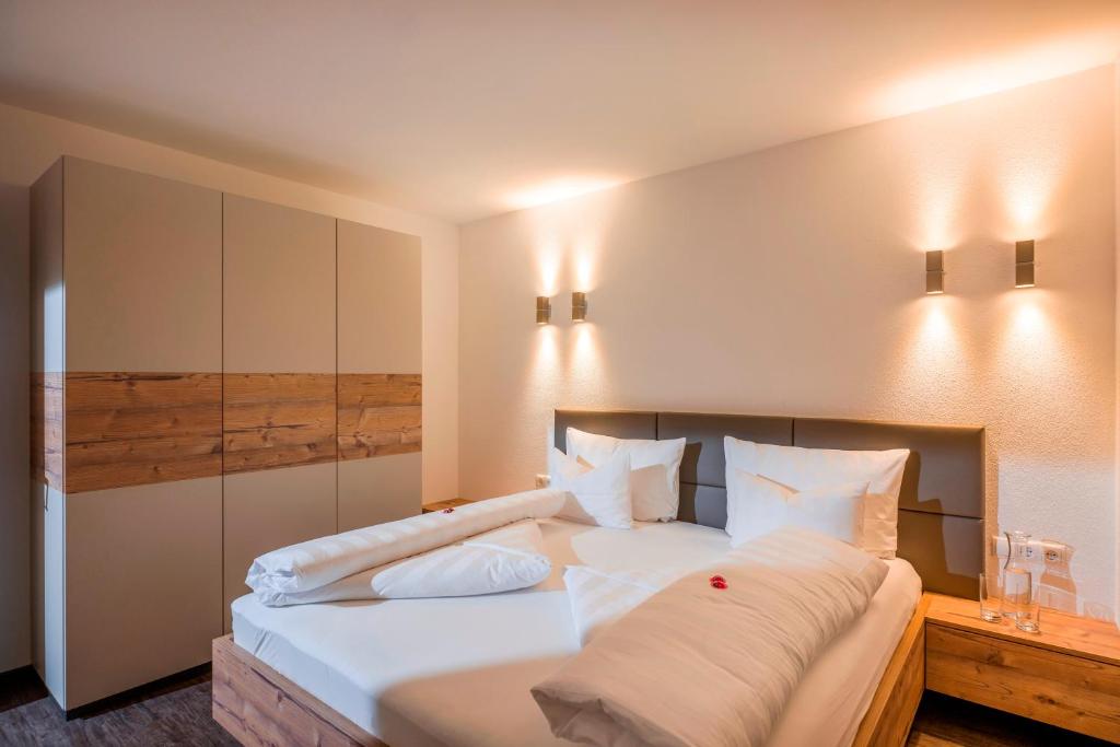 A bed or beds in a room at Apart Dengg