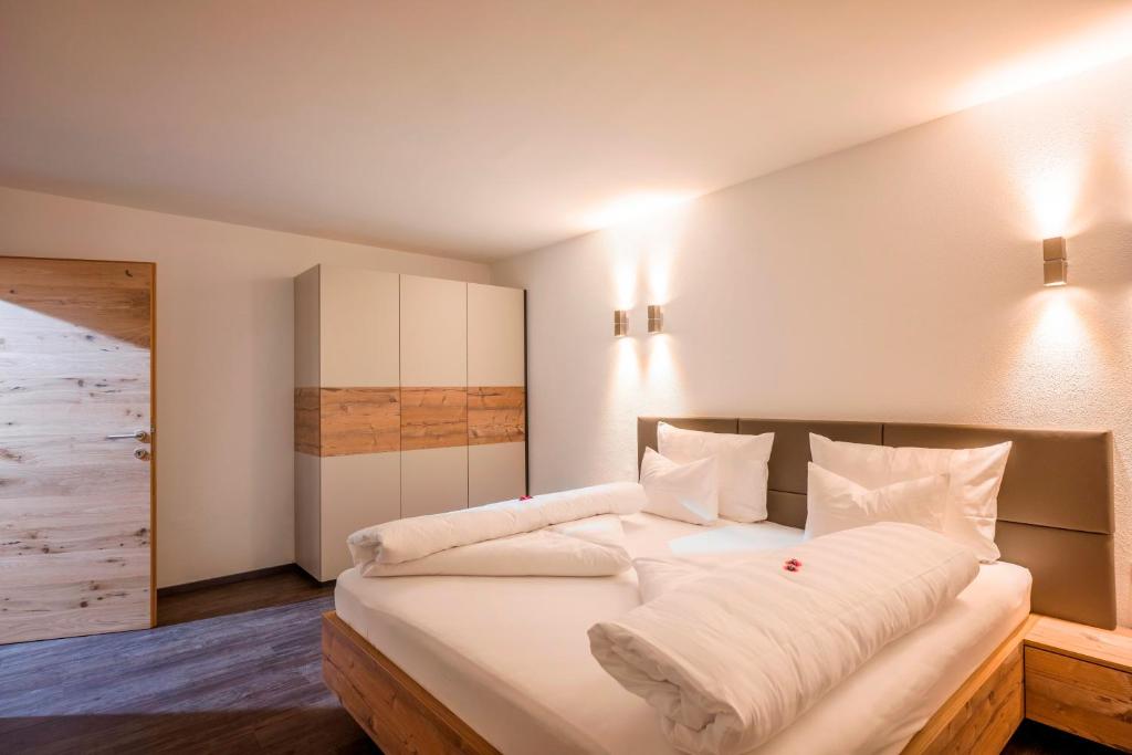A bed or beds in a room at Apart Dengg