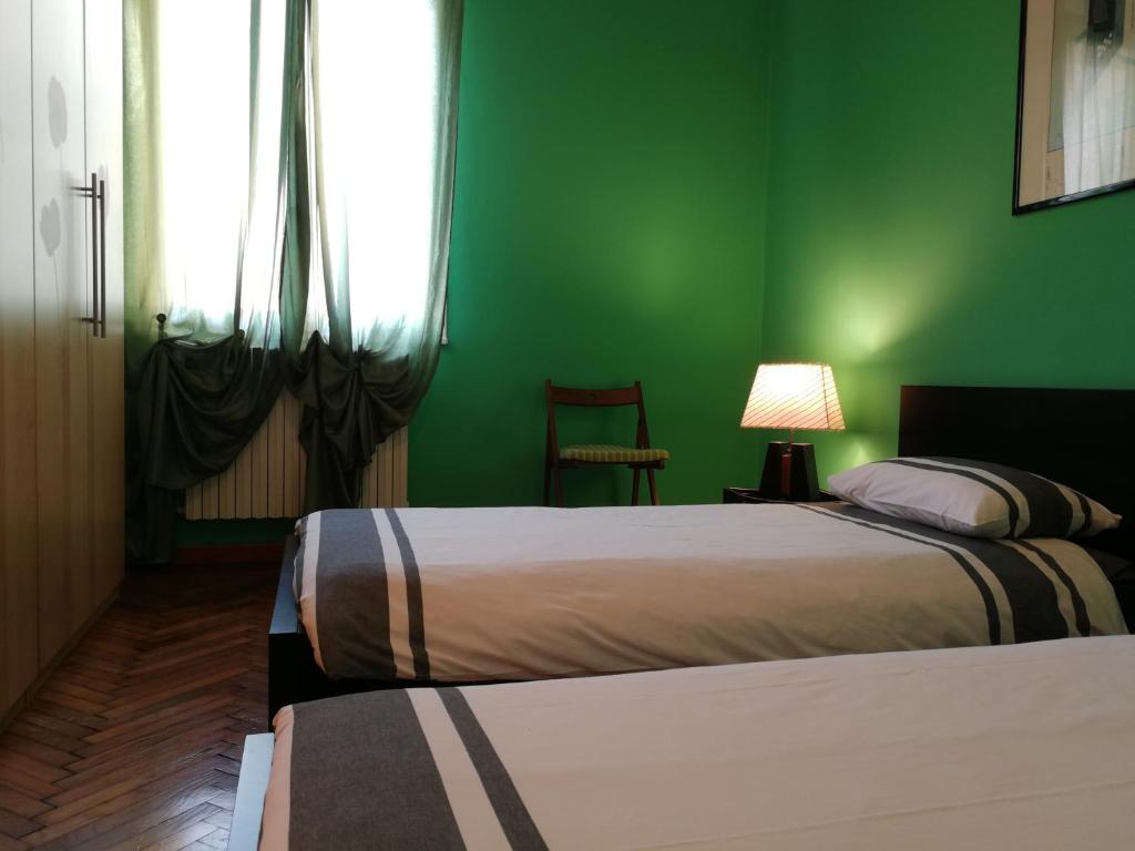 Ліжко або ліжка в номері Stella del Mattino