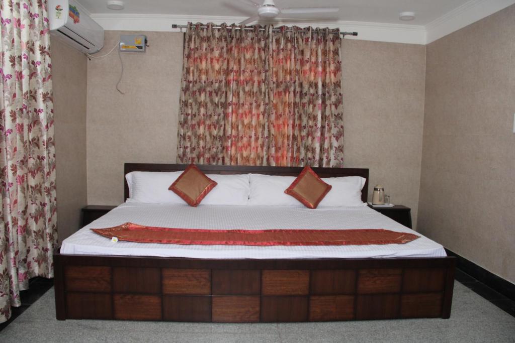 Кровать или кровати в номере Hotel Silk