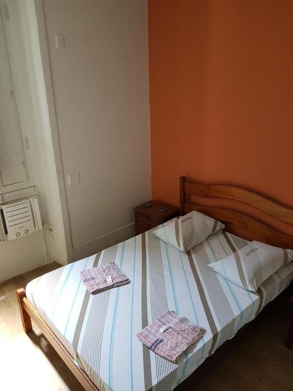 Säng eller sängar i ett rum på Hotel Cabo Finisterra