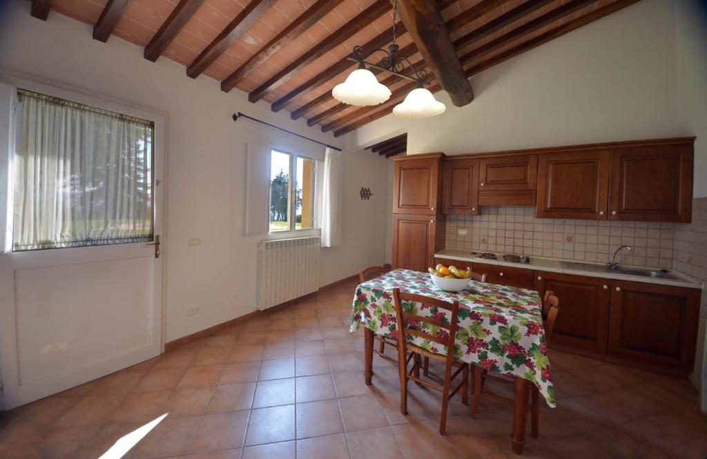 Kuchyň nebo kuchyňský kout v ubytování Agriturismo L'Imposto