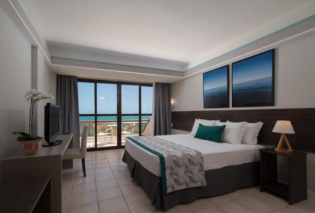 Cama ou camas em um quarto em Wish Natal