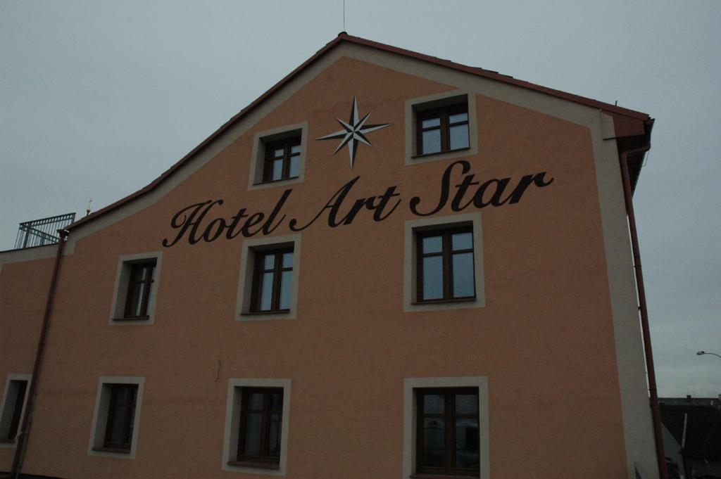 a building with the words hotel air star on it at Art Star Hotel in Hostivice