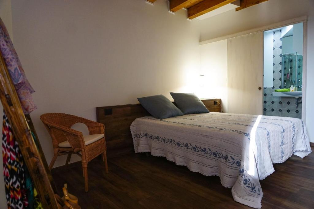 Postel nebo postele na pokoji v ubytování Casa di Nonno Mariano